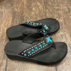 Turquoise and silver flip flops
